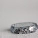 graphite grey size 8 multifaceted eco resin thin ring with metallic silver lakes