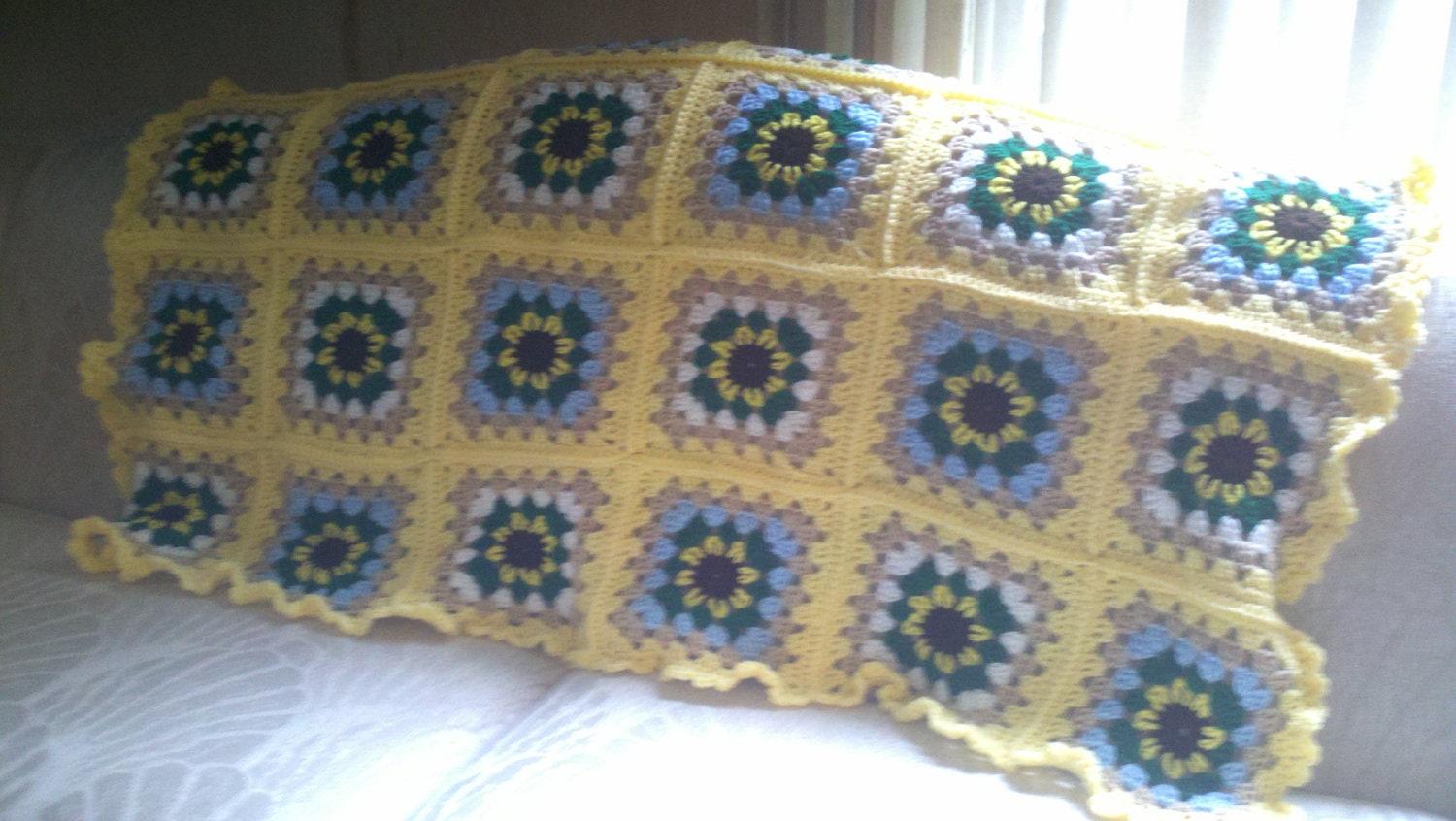 sunflower granny square lapghan