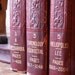 Set of Three Vintage 'American Educator' Encyclopedia Volumes - Deep Red Leather Tooled Covers