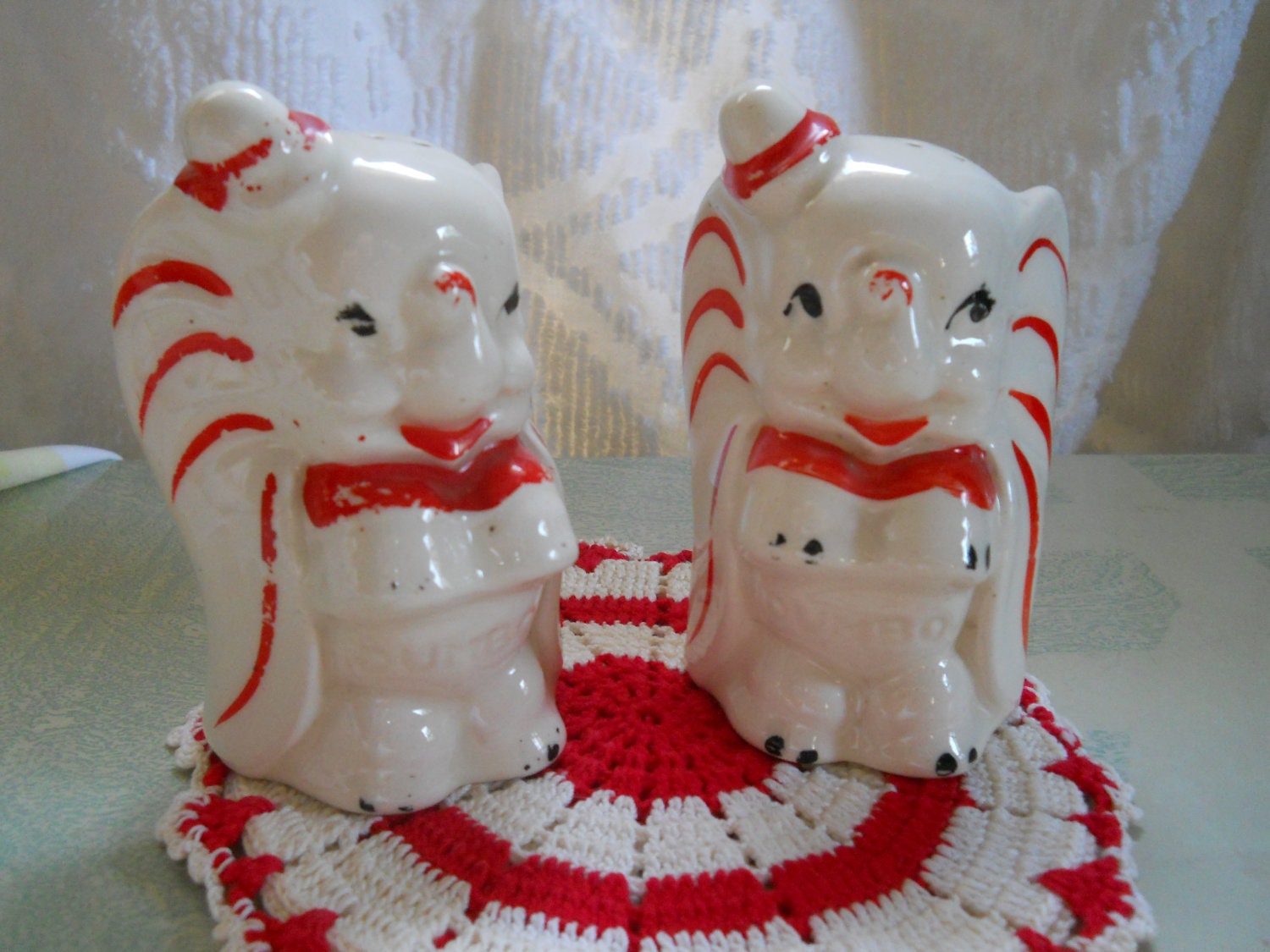 Red and White Mid Century Dumbo the Elephant Salt and Pepper Shakers with Lace Doiley