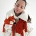 Hand knit fox scarf in red orange with polymer clay buttons, with ears and paws in white.
