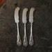 3 fancy Silver Plate Butter Knives