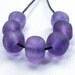 Handmade lampwork bead set of 7 streaky maroon faux sea glass beads