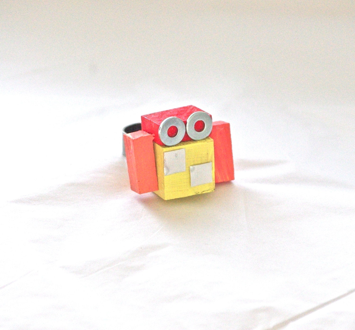 Robot Ring handmade from reclaimed wood and scrap metal accessories for men and for women geeks nerds red orange peach yellow