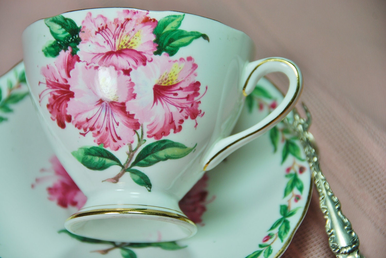 Beautiful GLADSTONE Tea Cup and Saucer "Laurel Time", Hibiscus, Pink, Green, Footed, England