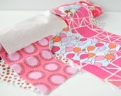 Quilting cotton fabric designer scrap roll Pink tones 2.