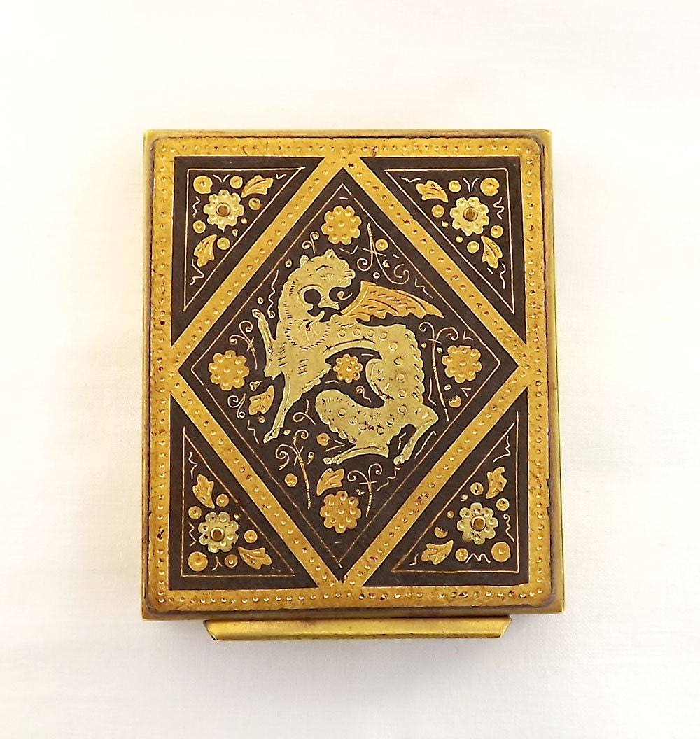 French powder compact with griffin decoration on lid
