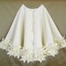 60" Christmas Tree Skirt in Premium Ivory felt with a double row of hand cut and hand sewn flowers at the hem. FREE SHIPPING
