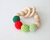 Red dot on shades of green. Teething ring toy with crochet wooden beads. Rattle for baby. - nihamaj