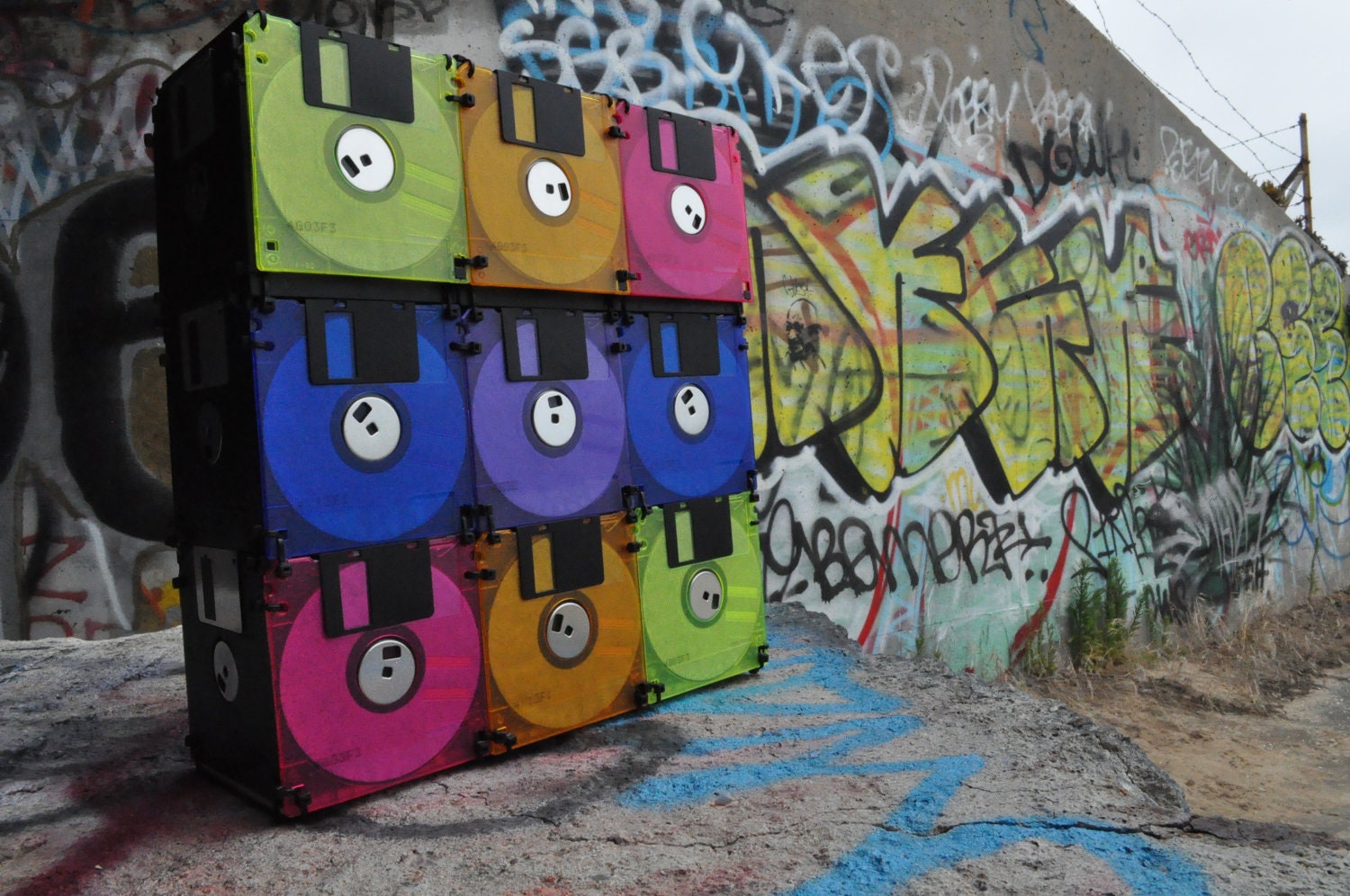 Sping colours floppy disk bag, pink, orange, neon yellow/green. blue, purple geek bag