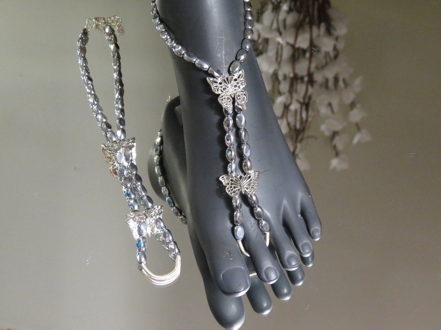 Butterfly Crystal Helix Beaded Barefoot Sandals on a thick durable elastic band. These have some give. Will fit shoe size 5-7 American Wome