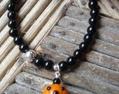 Black Obsidian Stretch Bracelet with Pumpkin Charm Dangle