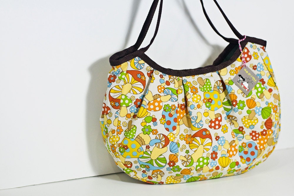 Malia handbag in limited quantity.  LAST ONE of this groovy mushroom print