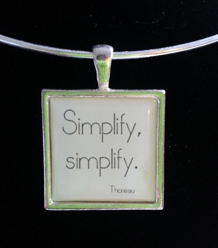Bookish necklace for complicated consumerists: Simplify, simplify
