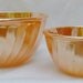 Peach Lustre mixing bowls, swirl pattern, Fire King, made by Anchor Hocking, set of two.