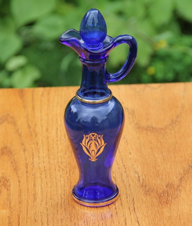 AVON Skin-So-Soft Cobalt Blue Glass Bottle with Gold Accents