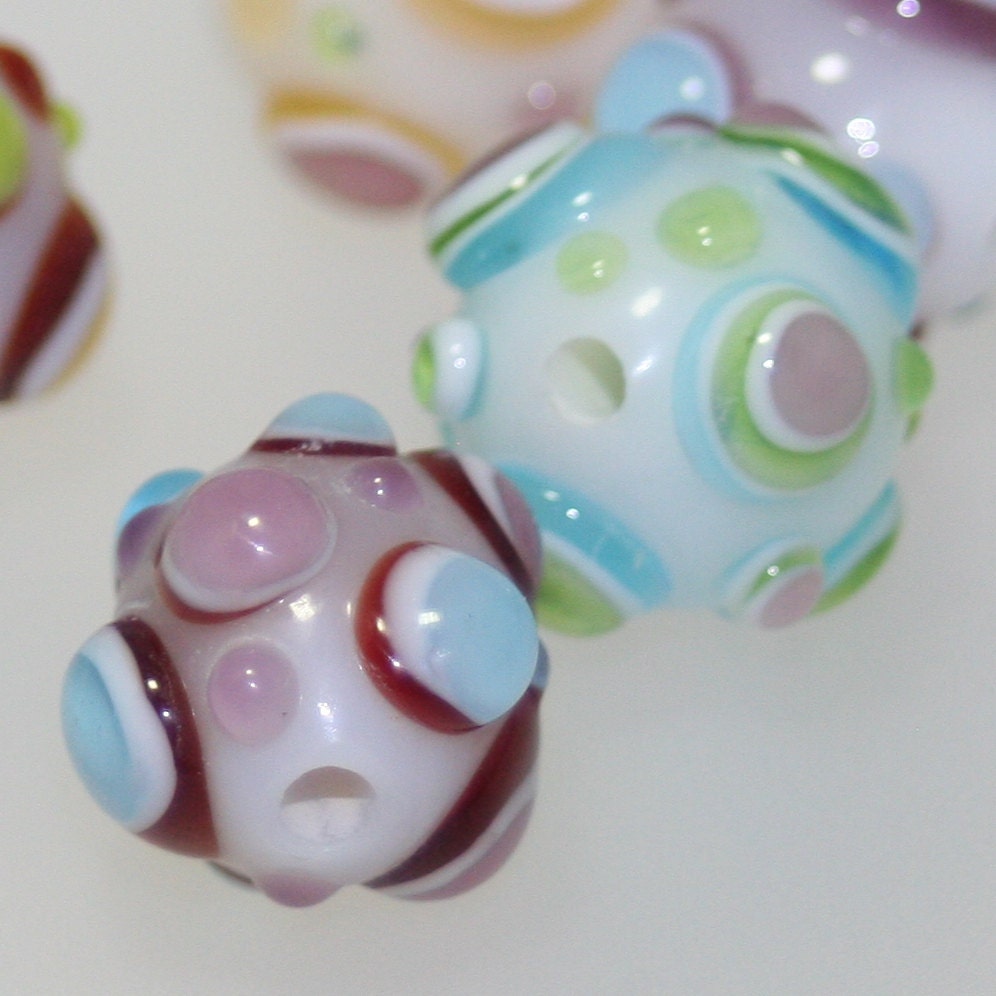 Multi color bright lampwork bead set with dots like bubbles