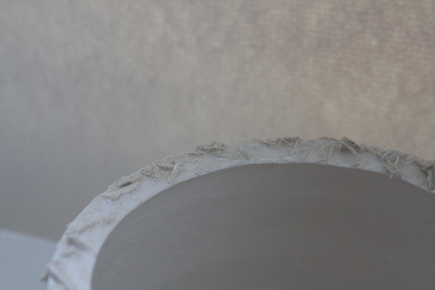 Unusual earthenware bowl with a unique textured rim.
