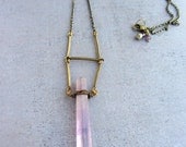 Purple amethyst gemstone long crystal point necklace.