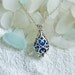 Sea glass locket necklace. Blue teardrop locket. Sea glass jewelry.