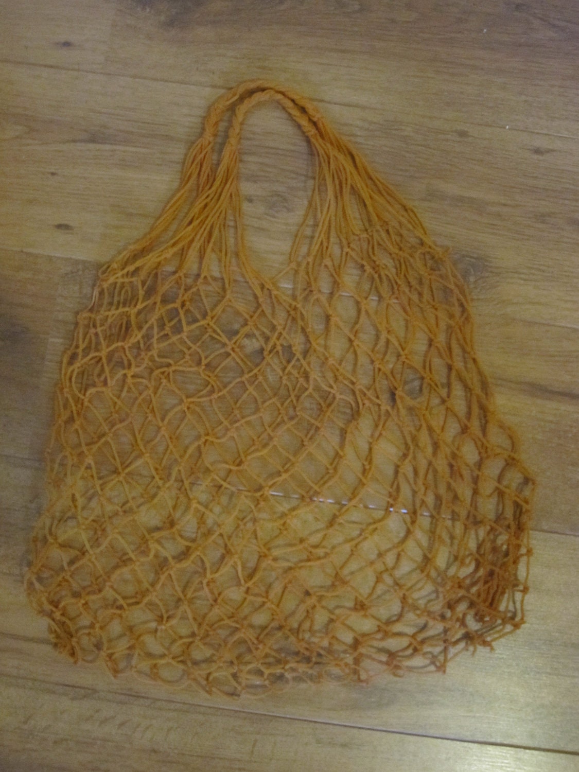 vintage 1970s orange-coloured shopping net