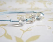 Bracelet crystal glass beads.Turquoise cotton string adjustable.