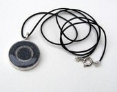 paper spiral wrapped pendant black and white book text