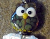 wise old owl lampwork bead on a pearl log necklace pendant