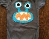 Turquoise Bernard the Monster sizes 3-6m, 6-12, 12-18