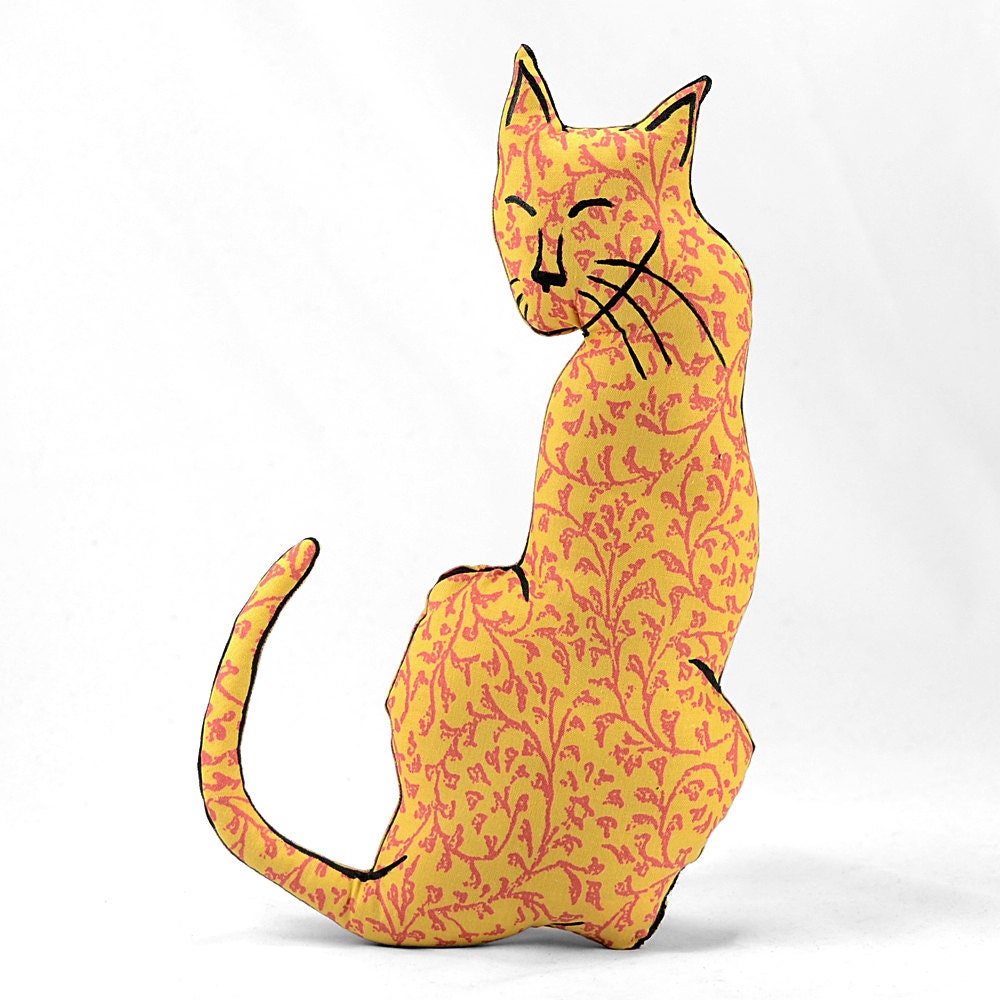 yellow red floral patterned cat shaped medium pillow