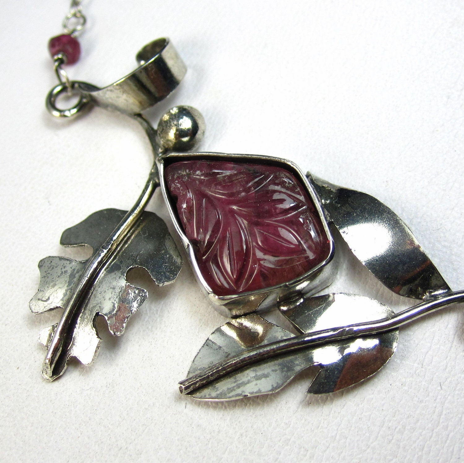 In the Shade Necklace - Carved Tourmaline and Sterling Leaves