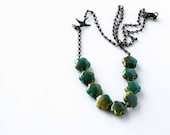 Bird and flower necklace