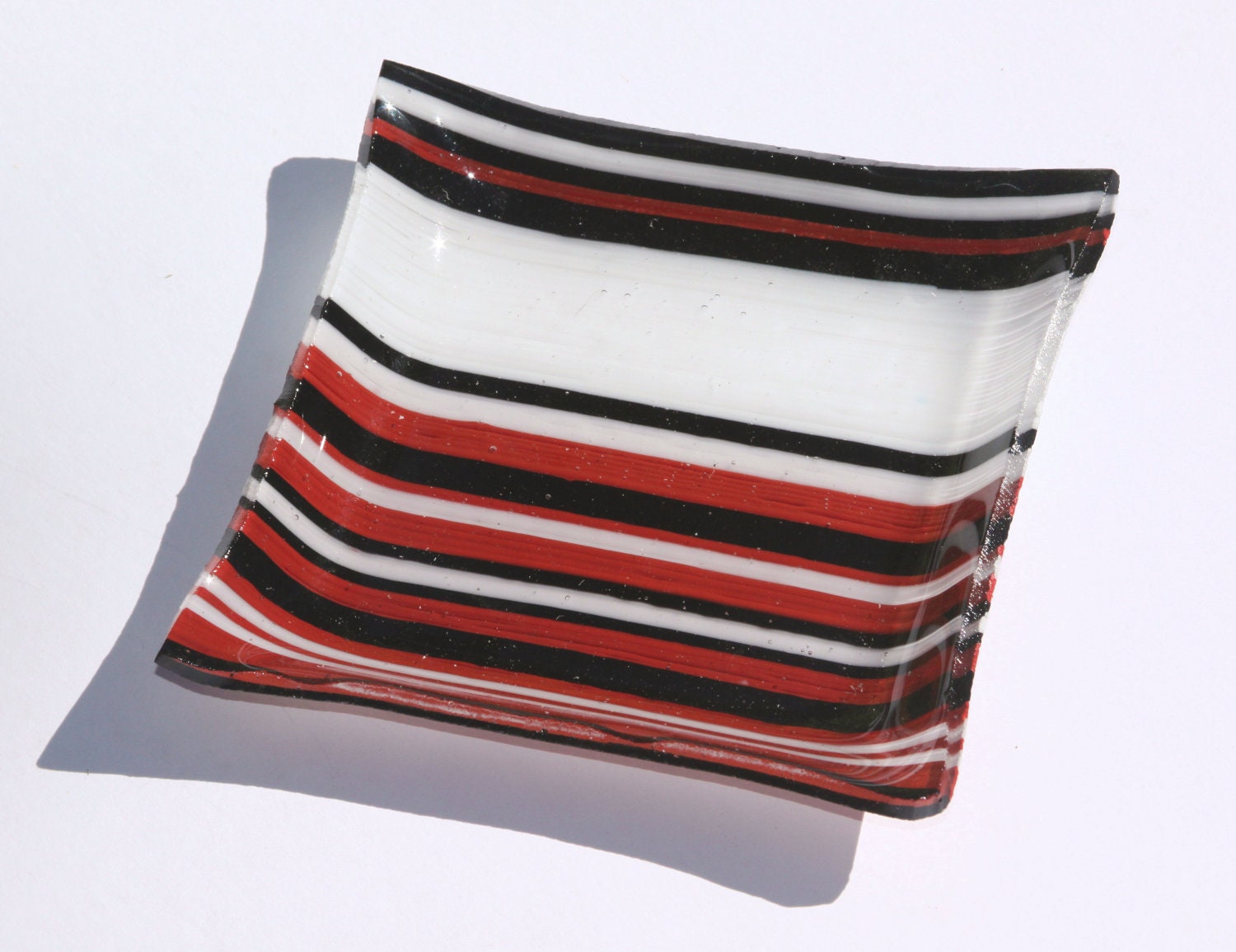 red and black striped fused glass bowl