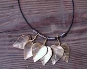 Six Brass Leaves Necklace on Black Cord