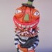 Bug Eyed Pumpkin Man clay folk art decor