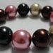 Simulated Brown, pink, black and cream Simulated Pearl Stretch Cord