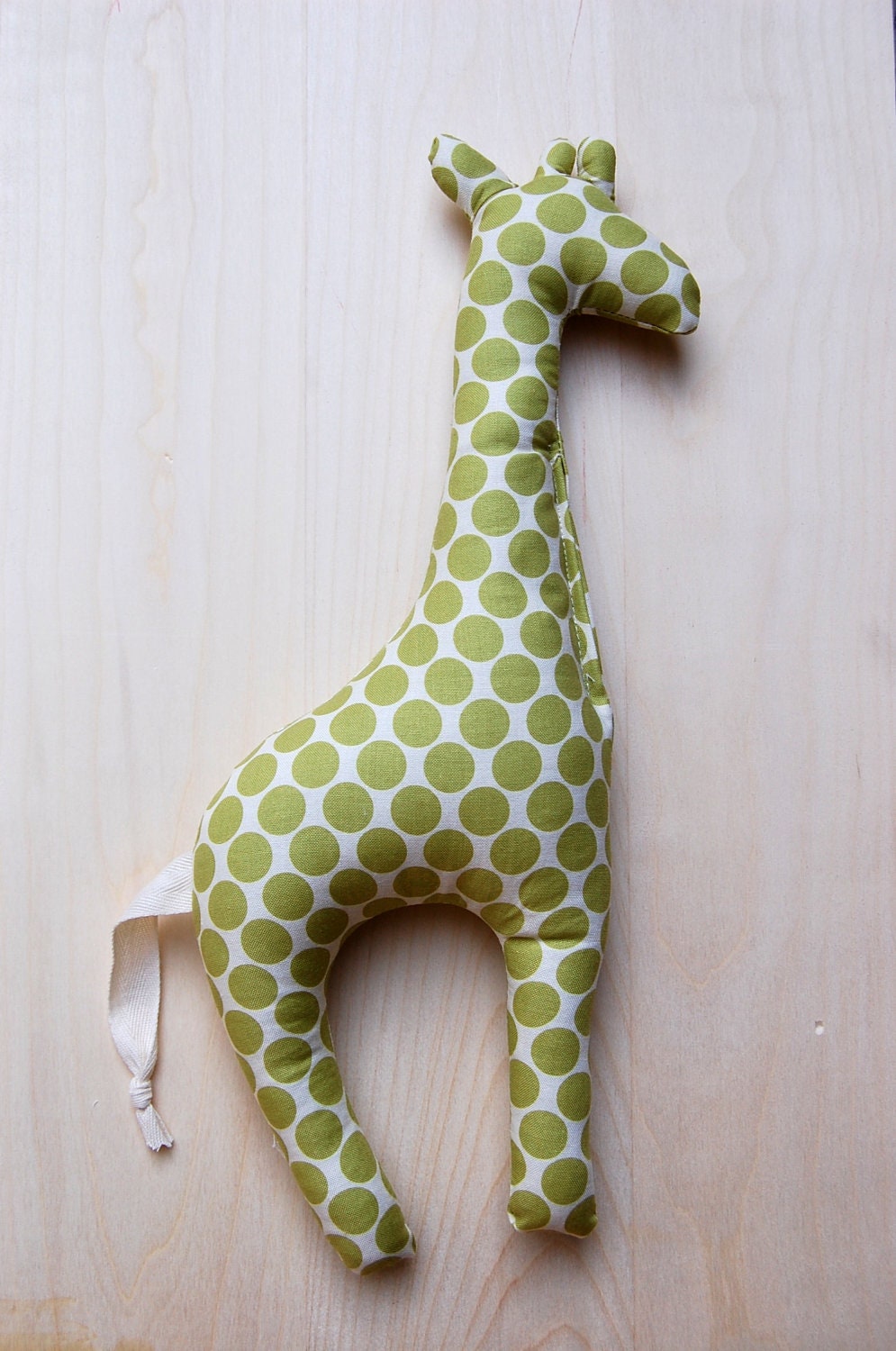 giraffe stuffed toy. lime polka dots