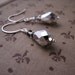 Silver Metallic drop earrings with vintage Swarovski comet argent crystals