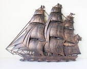 Plastic sailing ship wall hanging