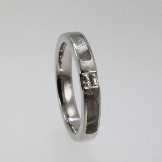 Meteorite Ring / Palladium Ring inlaid with strips of Meteorite on both sides of a center Moissanite Stone