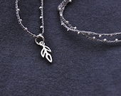 Tiny Leaf Outline daintiest crocheted beaded necklace in silver and warm gray with sterling silver leaf charm pendant