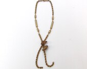 Small mushrooms on vintage chain, Honey