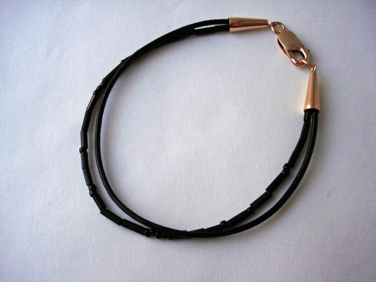 Black leather cord and beaded bracelet -- Fracture