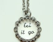 Let It Go.  Glass inspirational necklace.  Antique silver pendant.  Jewelry by Sweet And Simple.