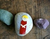 Story Stone - Child dressed red.