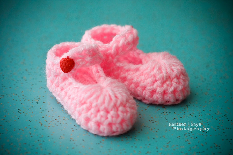 Crocheted Baby Shoes. Vibrant Pink Mary Janes with Vintage Red Strawberry Buttons. 3 to 6 months.