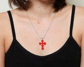 red dots cross necklace