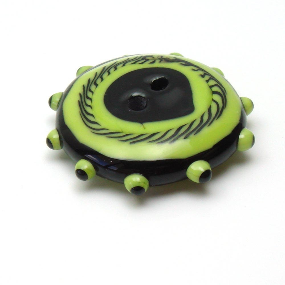 Handmade lampwork glass button  -  Lime with a Twist -  bright lime, black, folk button, green glass button