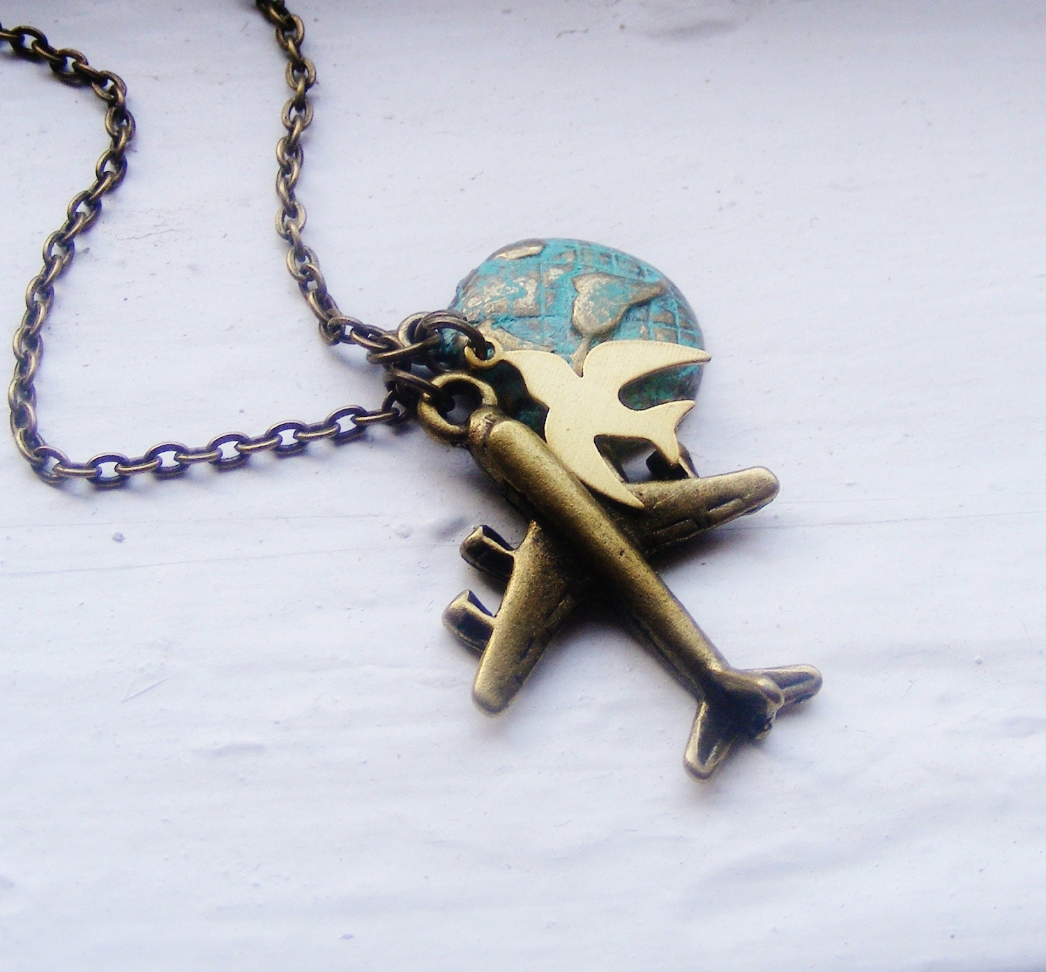 Airplane Globe Necklace. World Traveler. Sparrow Necklace. Verdigris. Swallow. Air Force. Plane. Jet.