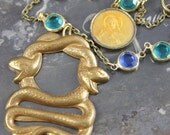 Venomous Necklace with Bezel Set Stones and Snake Charm